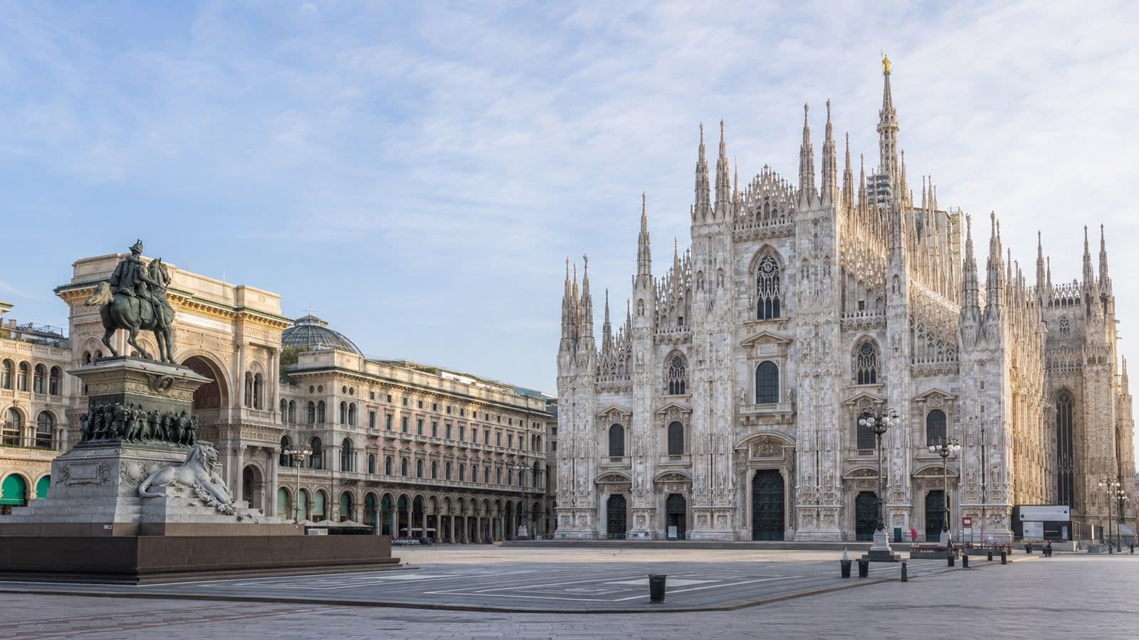 Milan Cathedral (Duomo di Milano) in Piazza del Duomo, Milan, Italy, with the Galleria Vittorio Emanuele II in the background
