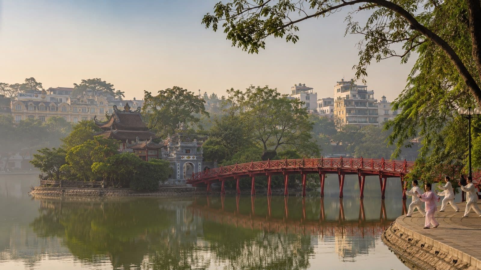 Hoan Kiem Lake and iconic red bridge in Hanoi, Vietnam