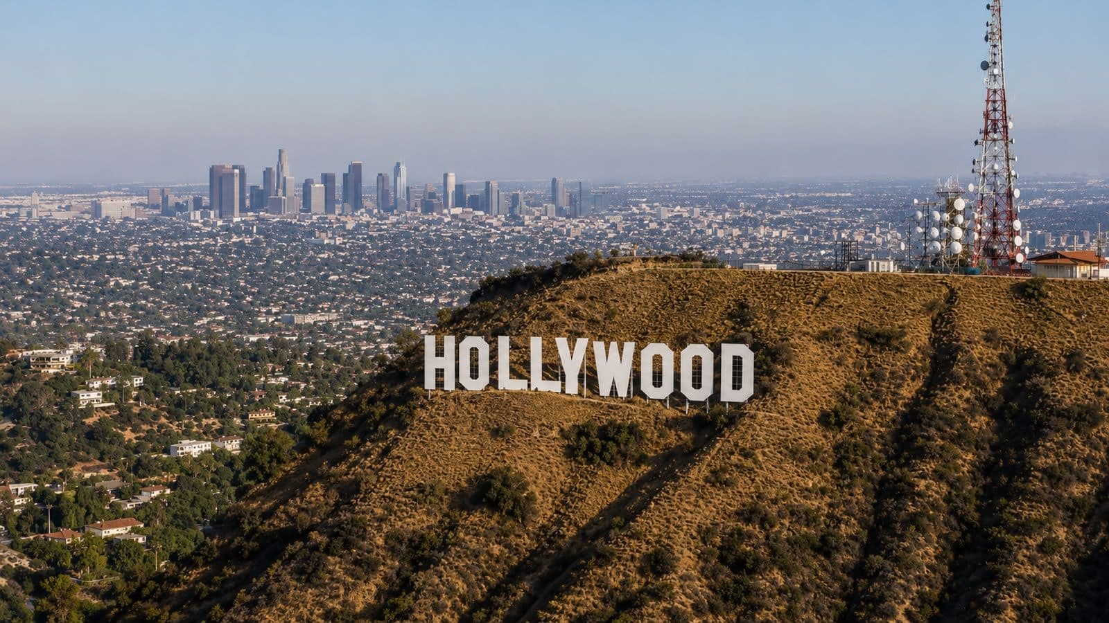 Panoramic view of the Hollywood Sign overlooking Los Angeles and the downtown skyline.